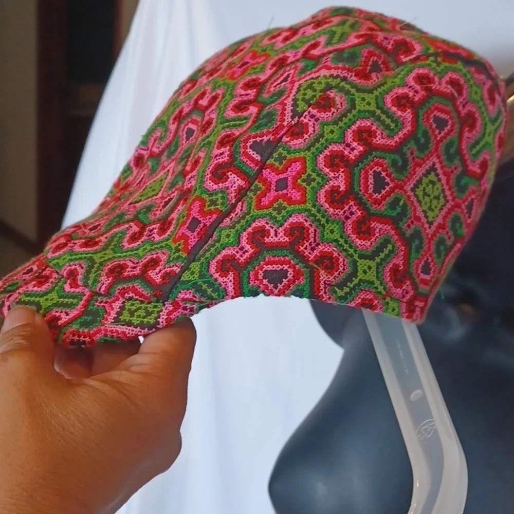 Embroidered ponytail hat.  Hair up, down, or in-between!          Size M/L.